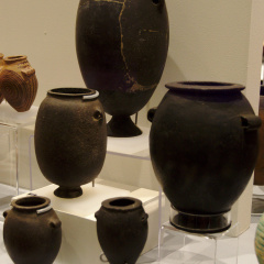 Three Stone Lug-Handled Jars (Left) Plus Two Ceramic Lug-handled Jars Painted to Look Like Stone (Right)