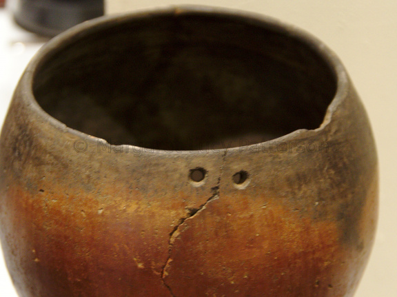 Black-topped Red-ware Vessel with Rivet Holes