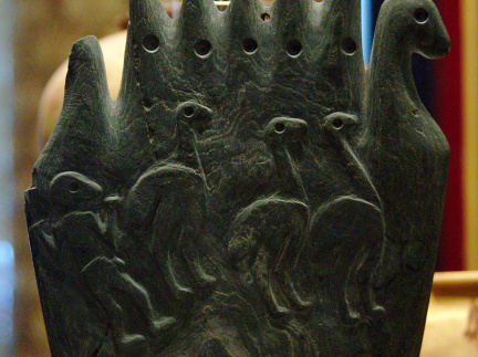 Greywacke Palette with the Form of Two Birds' Heads and Ostrich Carvings