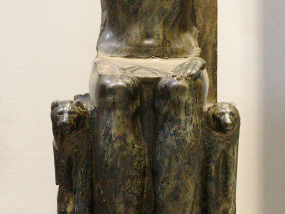 Statue of a King on a Throne with Lion Arms