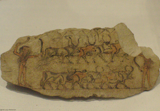 Ostracon Showing Two Men Herding Cows
