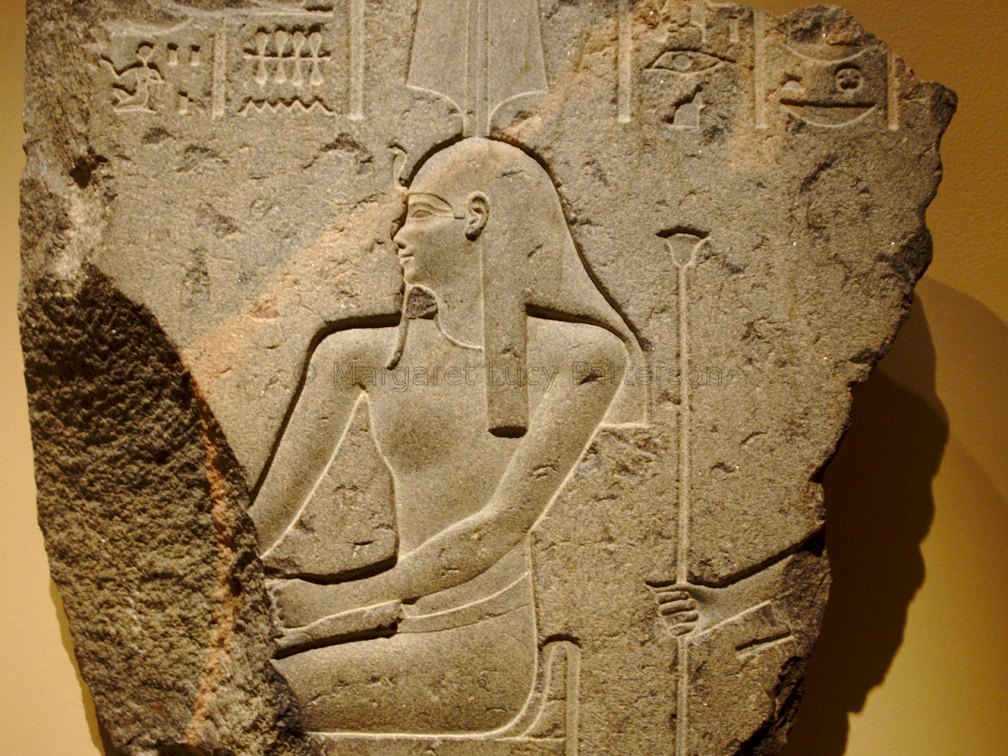 Relief of a Seated God