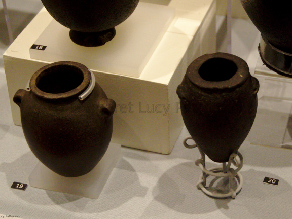One Stone Jar (left) and one Ceramic Lug-handled Jar Painted to Look Like Stone
