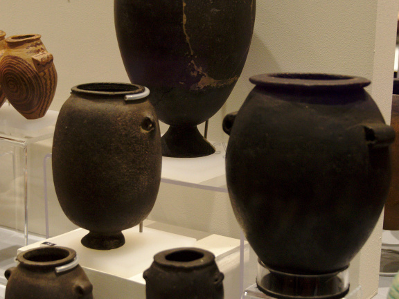 Three Stone Lug-Handled Jars (Left) Plus Two Ceramic Lug-handled Jars Painted to Look Like Stone (Right)