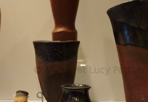 Two Black-topped Red Ware Vessels With a Model Vessel (left)