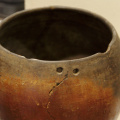 Black-topped Red-ware Vessel with Rivet Holes