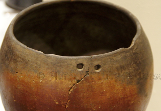 Black-topped Red-ware Vessel with Rivet Holes
