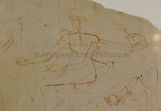 Ostracon with a Sketch of a Seated Goddess with Horus Holding a Shen Ring Behind Her