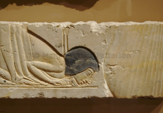 Relief Fragment Depicting Two Bowing Courtiers Behind Nefertiti