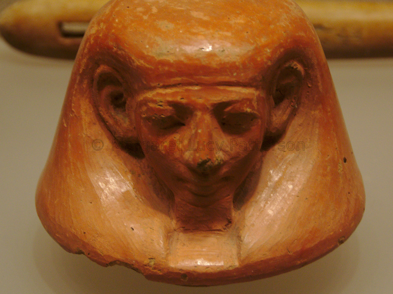 A Pottery Human-Headed Lid of a Canopic Jar