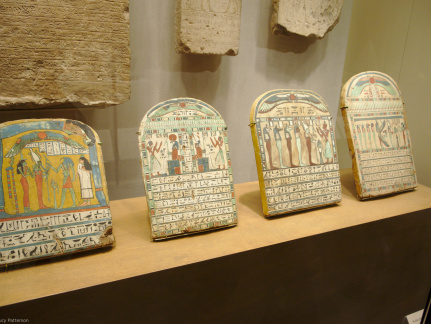 Four Painted Wooden Stelae